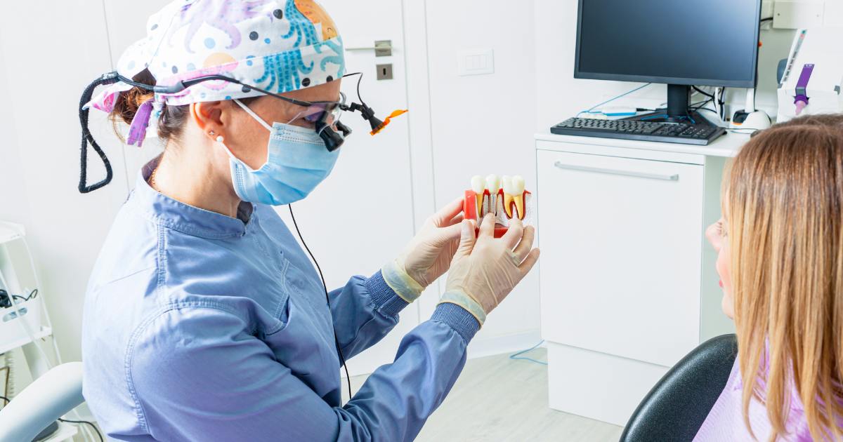 doctor explaining about failure of the dental implants